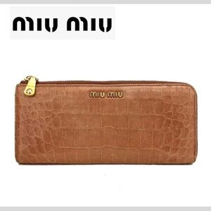 MIU MIU Logo Embossed Leather Zippy Long Wallet